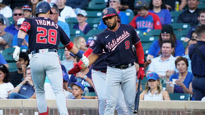 Washington Nationals outfielder Lane Thomas, infielder Jeimer Candelario